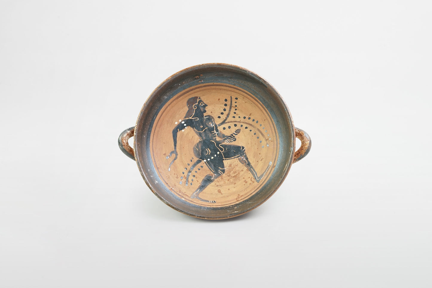 Schwarz glasierte Kylix mit laufendem nackten Athleten – Griechenland, 5. Jahrhundert v. Chr.