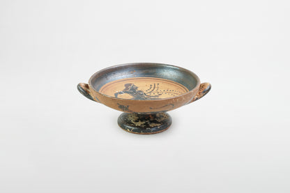 Schwarz glasierte Kylix mit laufendem nackten Athleten – Griechenland, 5. Jahrhundert v. Chr.