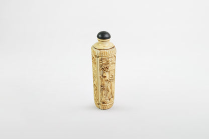 Richly decorated ivory snuff bottle – China, 19th century
