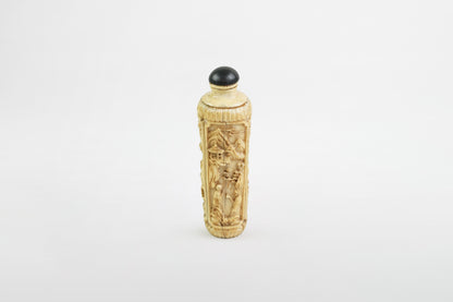 Richly decorated ivory snuff bottle – China, 19th century