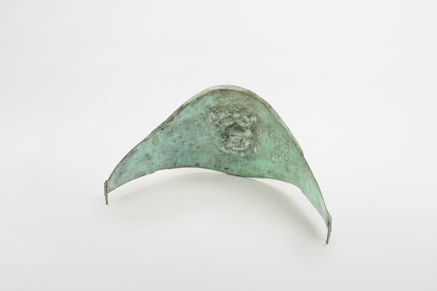 Bronze lower abdomen protection with embossed lion’s head – Rome, 1st/2nd century